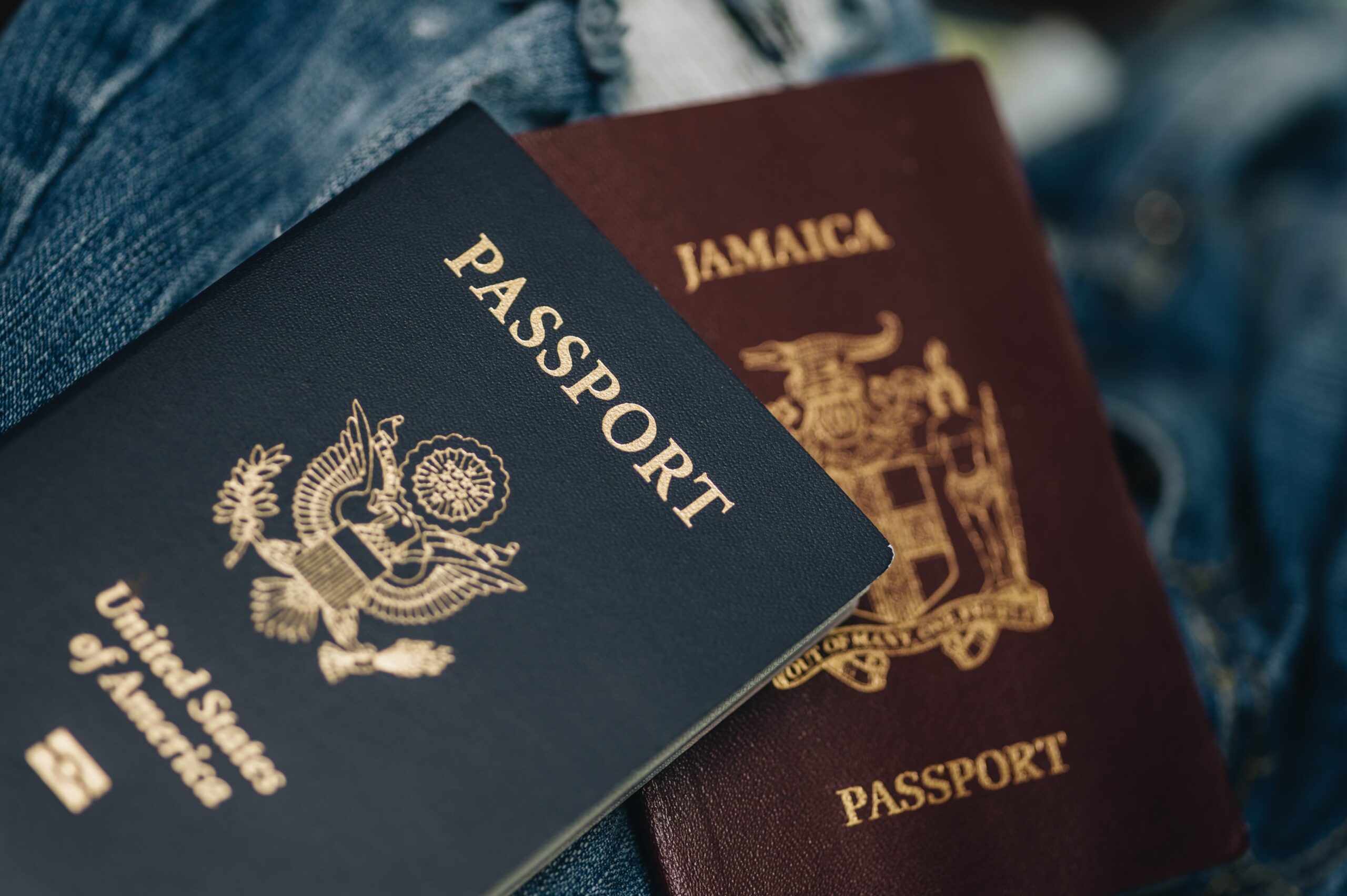 close-up-of-jamaican-passport-and-a-united-states-2022-11-15-06-43-11-utc-min-scaled.jpg